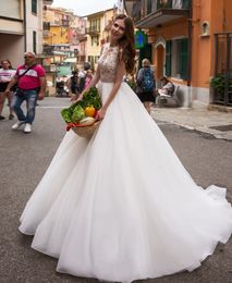 Amazing Lace Beaded Wedding Dresses Sheer High Neck A Line Covered Buttons Back Bridal Gowns Tulle Sweep Train robe de mariée