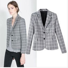 Shop by category Go for fashion with your silhouette this season with this classic check blazer featuring double breasted buttons and wide collar. Perfect to smarten up your jeans and tee look or wear over a pretty mini skirt and tee for an alternative spin on this versatile blazer.