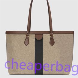 tan gucci handbolsa