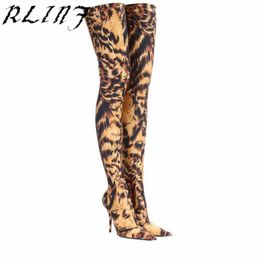 leopard print thigh boots