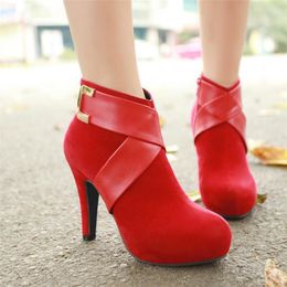 green cross ankle boots