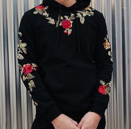 black hoodie with flowers