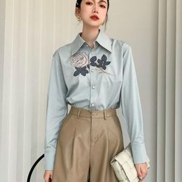 blusas de flores mujer