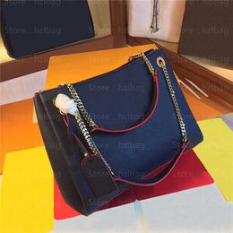 navy designer handbag
