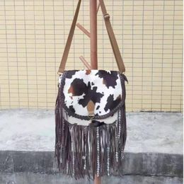 suede fringe handbolsa