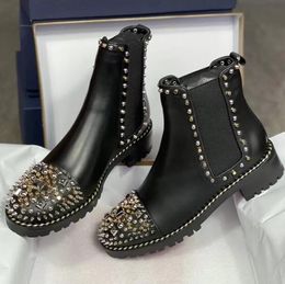 spike studded ankle boots