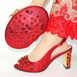 red heels and matching bolsa
