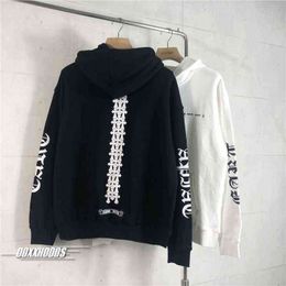 black sweater with white strings