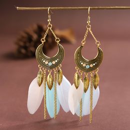 Pendientes De Plumas Largas De Cuerda Tejida De La Nación De Pendientes De Plumas Largas De Cuerda Tejida De La Nación De