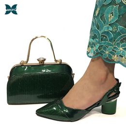 green shoes and matching bolsa