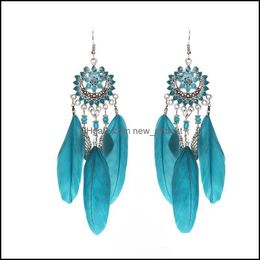 Pendientes De Plumas Largas De Cuerda Tejida De La Nación De Pendientes De Plumas Largas De Cuerda Tejida De La Nación De