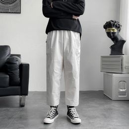 half black half white cargo pants