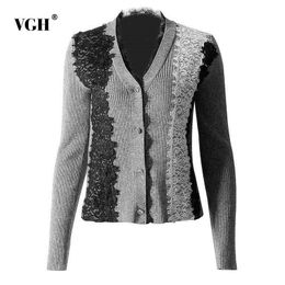 Suéter de moda para mujer cárdigan con cuello en V lazo de encaje .. Suéter de moda para mujer cárdigan con cuello en V lazo de encaje ..