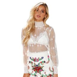 blusa transparente blanca