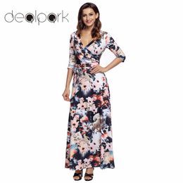 Black and white maxi dress with gold belt Black and white maxi dress with gold belt
