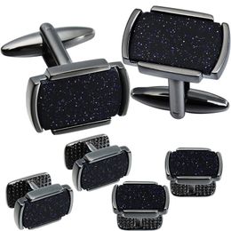 black cufflinks and studs