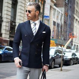 navy jacket grey trousers
