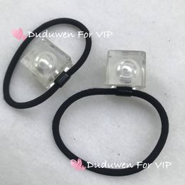 2cmX2cm bloque interior perla cuerda de pelo banda de pelo de moda regalo de fiesta corbata de pelo de moda C marcas duduVIP