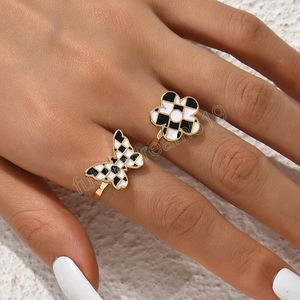 2 pièces mignon blanc noir émail papillon fleur anneau ensemble pour femmes Vintage métal or couleur doigt Double anneau bijoux de mode