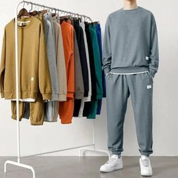 2pcSset Men Sport Casual Sport Texture Waffle Texture Oneck Sweatshirt à manches longues POCHETS ÉLASTIQUE ÉLASTIQUE PAPT JOGGER Set Loose Fit Swe 240416