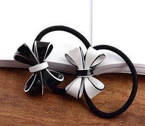 3.5X4.5CM noir et blanc acrylique arc élastiques cheveux anneau tête corde épingle à cheveux pour dames coiffure préférée bijoux accessoires cadeaux vip