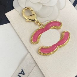 3,8x6.5cm Llavero de llaves de llavero Ring Rose Red Red Double Letter Diseñadores Keychains para Porte Clef Regalos Hombres Mujeres Accesorios de moda de la moda