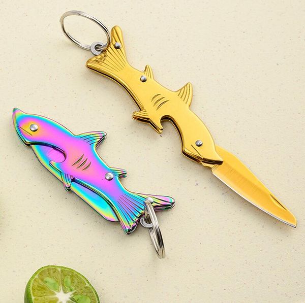 3 colores Estilo de tiburón Cuchillo de tecla Mini cuchillo de cuchillo plegable cuchillos al aire libre Campos de caza Mujer Hombre Bacera de bolsas EDC Hool shitking Blade Al por mayor