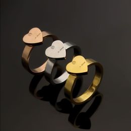 3 colores de calidad superior extravagante simple corazón amor anillo oro lujo titanio acero pareja anillos moda mujer diseñador joyería dama par wdmk