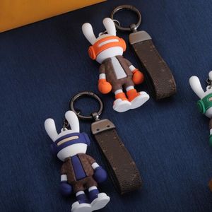 3 couleurs Très mignon Porte-clés de voiture en cuir véritable Designer de luxe Bijoux Porte-clés Pendentif de mode Marque Porte-clés pour charme hommes femmes avec boîte-cadeau originale