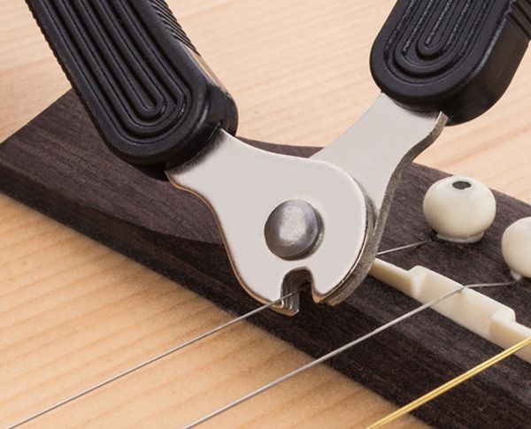 3 en 1 Changeur de guitare Changeur multifonction de guitare enrouleur Pin de coupe de coupe pour les guitares Banjos Mandolins Accessoires