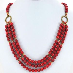 Collier à bascule en or à 3 brins de perles rondes en corail rouge 19 243C