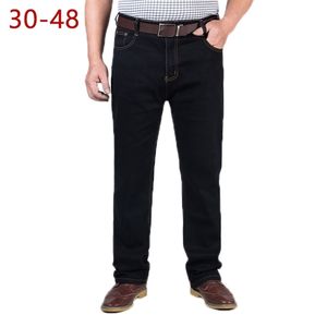 30-48 grande taille classique baggy jeans pour hommes printemps automne mâle décontracté stretch droit marque fermeture éclair affaires noir denim pantalon 201111