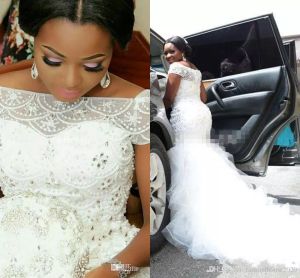 Plus Storlek Arabiska Nigerianska Bröllopsklänningar Bateau Neck Beading Tiered Short Sleeves Long Chapel Train Tulle Mermaid Bridal Gowns