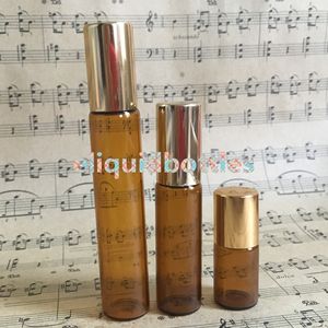 Heißer Verkauf auf den Philippinen, USA, Goldverschluss, 3 ml, 5 ml, 10 ml, bernsteinfarbene Glasflaschen mit Metallrollkugeln für Roll-on-Behälter zur Elusion ätherischer Öle