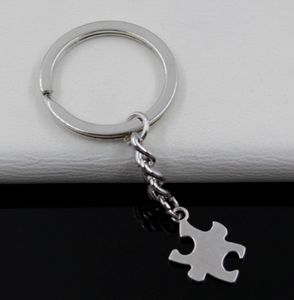 Fashion 20pcs/lot Key Ring Keychain Jewelry Silver Plated puzzle piece Charms