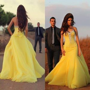 Luxury Crystals Pearls Beaded Yellow Prom Dresses Sweetheart Neckline Sleeveless Wedding Party Formal Wear with Bow Attached Train