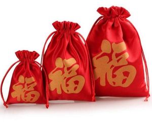 Gratis olika storlekar högkvalitativa kinesiska förmögenhet väska röd silke väska smycken väskor bröllopsfest godis pärlor xmas presentpåse