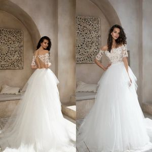 Abiti da sposa linea A Tulle Applique Gonne a balze in pizzo Abiti da sposa Indietro Abiti da sposa lunghi fino al pavimento Abiti da sposa