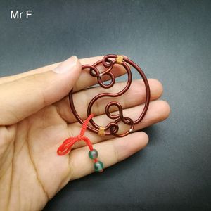 Wholesale copper wire china resale online - Kid Gift Chinese Tai Chi Shape Red Copper Wire Puzzle Handwork Novelty Game Brain Teaser