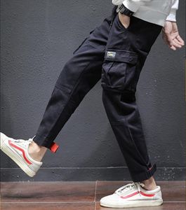 Designer de moda Esporte Calças Homens De Luxo Corredores Com Letras Elásticas Jogging Sweatpants Mens Calças Frete Grátis