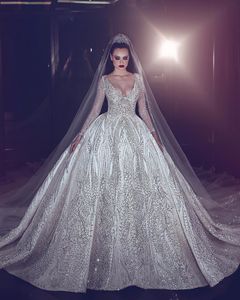 Luxury Beading Wedding Dress Princess Illusion Långärmad Bröllopsklänning Sexig Deep V Neck Ball Gown Bridal Dresses