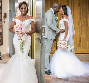 Nigeryjska afrykańska syrenka suknie ślubne Off Shoulder koronkowa aplikacja perły Backless ślubne suknie ślubne Plus rozmiar suknie ślubne