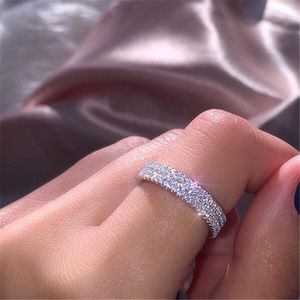 Vendita calda gioielli di lusso Splendido argento sterling 925 tre file pavimenta zaffiro bianco diamante CZ pietre preziose donne anello nuziale regalo