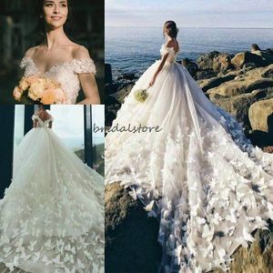 Boho Beach Ball Gown Farfalla Abiti da sposa Spalle scoperte Cattedrale di treno Eleganti abiti da sposa africani 2020 Corsetto abiti da sposa
