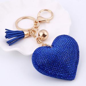 Prezzo all'ingrosso del regalo automatico del pendente del sacchetto di fascino dell'anello chiave della catena chiave del Rhinestone di cristallo del supporto chiave della nappa del cuoio del Keychain del cuore