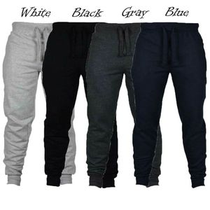 Män Slim Fit Tracksuit Casual Skinny Jogging Solid Fashion Joggers Svettbyxor Byxor Plus Storlek S-2XL