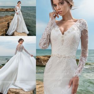 Sexig Elegant Vit V-Neck Mermaid Bröllopsklänningar Med Avtagbar Tåg Lace Appliques Långärmad Sheer Back Buttons Beach Bridal Gowns