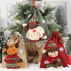 Decorazione natalizia Borsa regalo con coulisse Borsa di caramelle di lino Cartone animato Babbo Natale Pupazzo di neve Alce Borsa regalo di Natale Borsa Xmas Apple Borse DBC VT1028