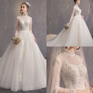 Modest YL Ball Gown High Neck Long Sleeve Hollow Wedding Dresses Lace Applique Pearls Wedding Gowns Sweep Train Bridal Gowns