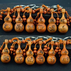 Hot Sale Peach Wood Carving Key Knapp Twelve Zodiac Knapp Knapp Hängande Stycke Gourd Key Button Hängande bit Partihandel